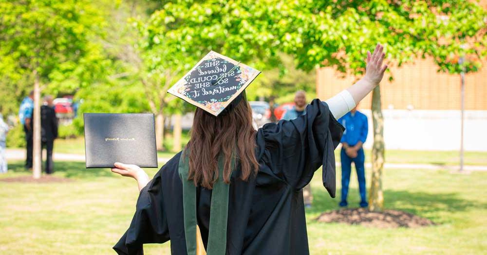 A student celebrates post graduation